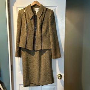 Casual suite. Beige/brown. Not new. Zipper and leather details.